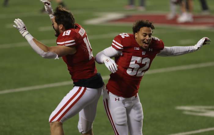 Nick Herbig and Kaden Johnson celebrate a home win.